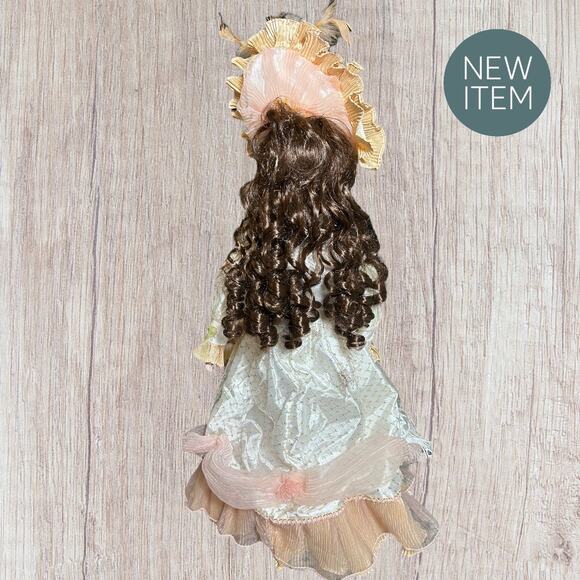 25” Victorian Porcelain Doll w/ Stand – Ivory & Peach Gown, Curly Hair - Picture 3 of 6